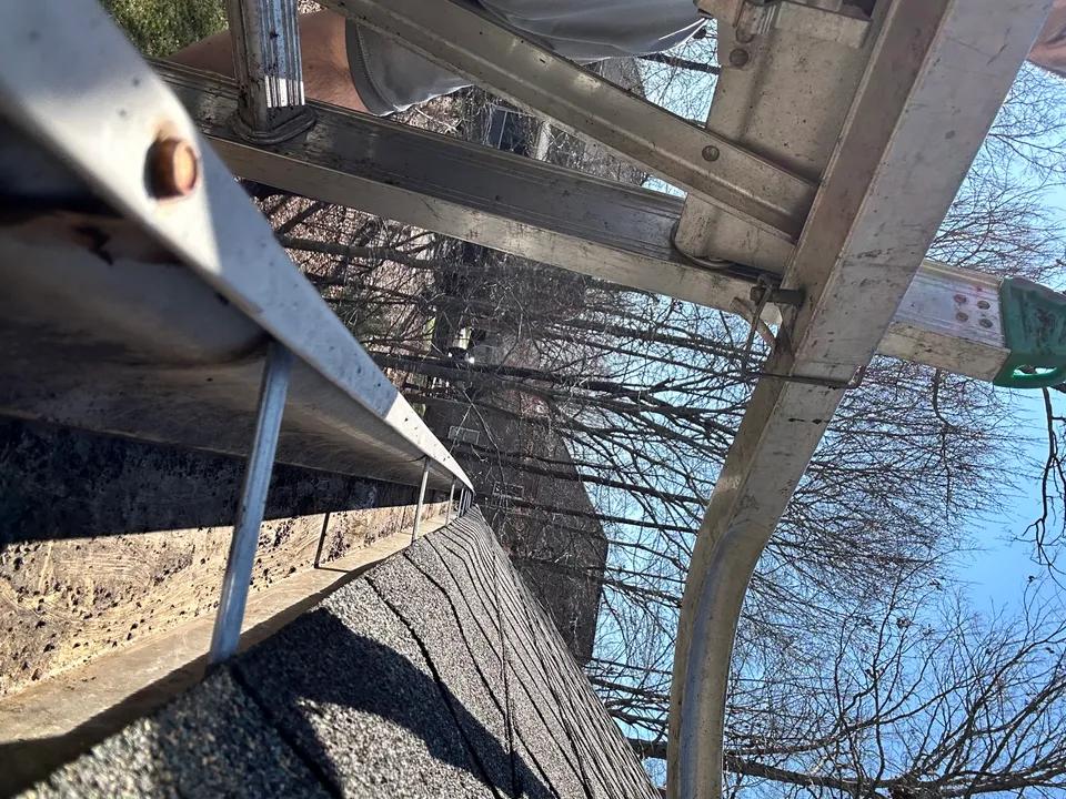 Huntersville gutter cleaning before and after