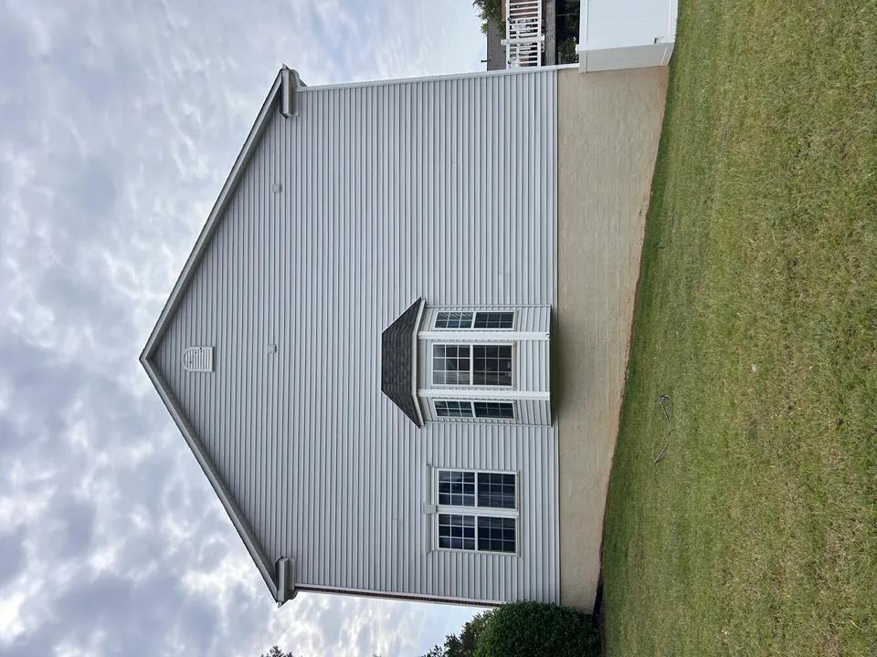 Pressure washing a driveway in Huntersville, NC