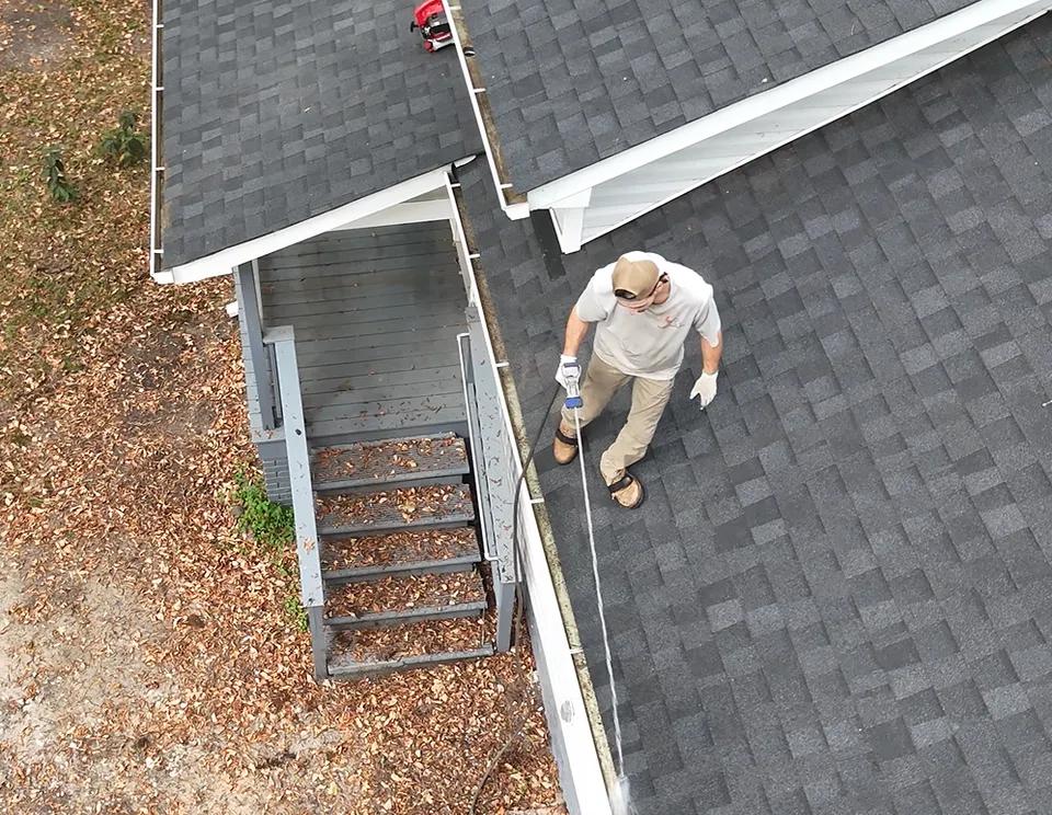 Fort Mill gutters filled with debris before guard installation