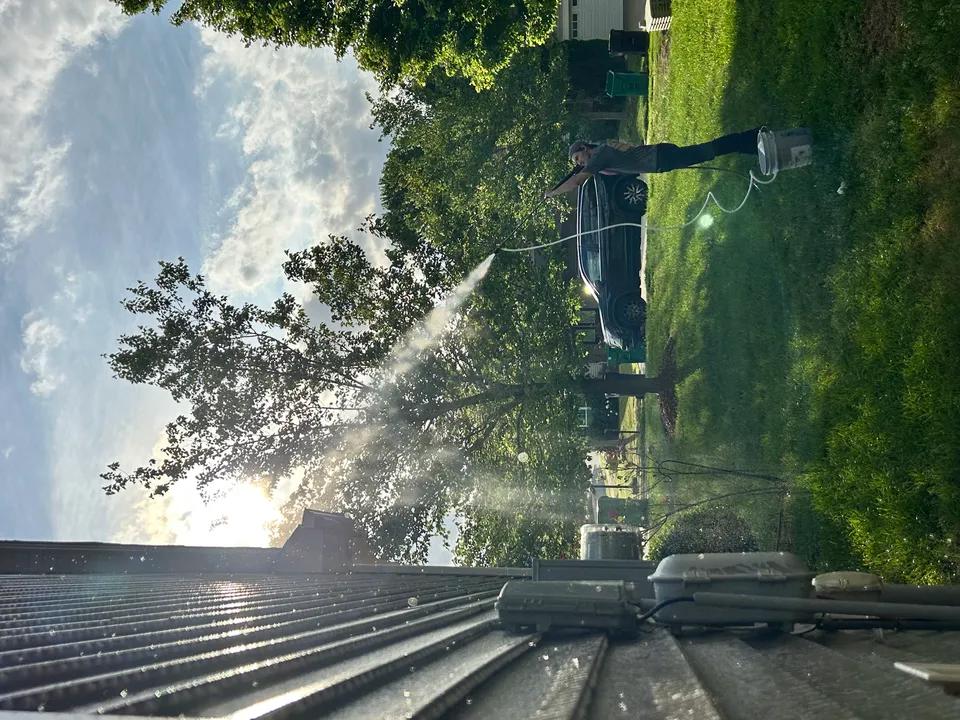 Pressure washing a driveway in Ballantyne, NC