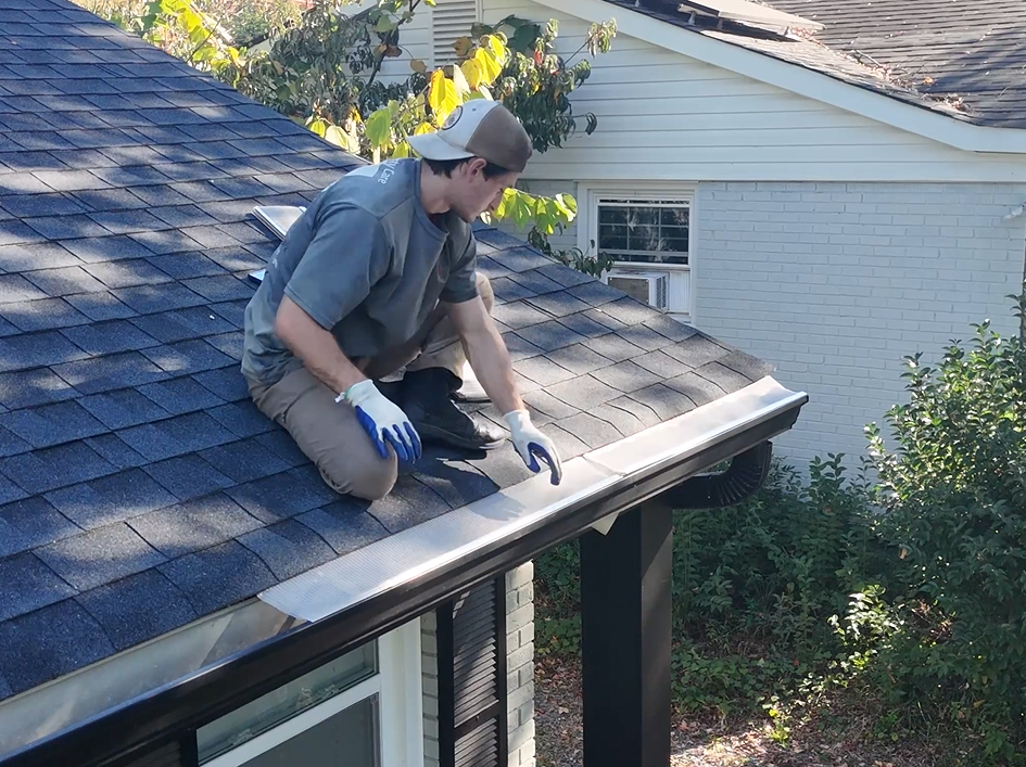 Stainless steel micro-mesh gutter guard installed on a Charlotte home