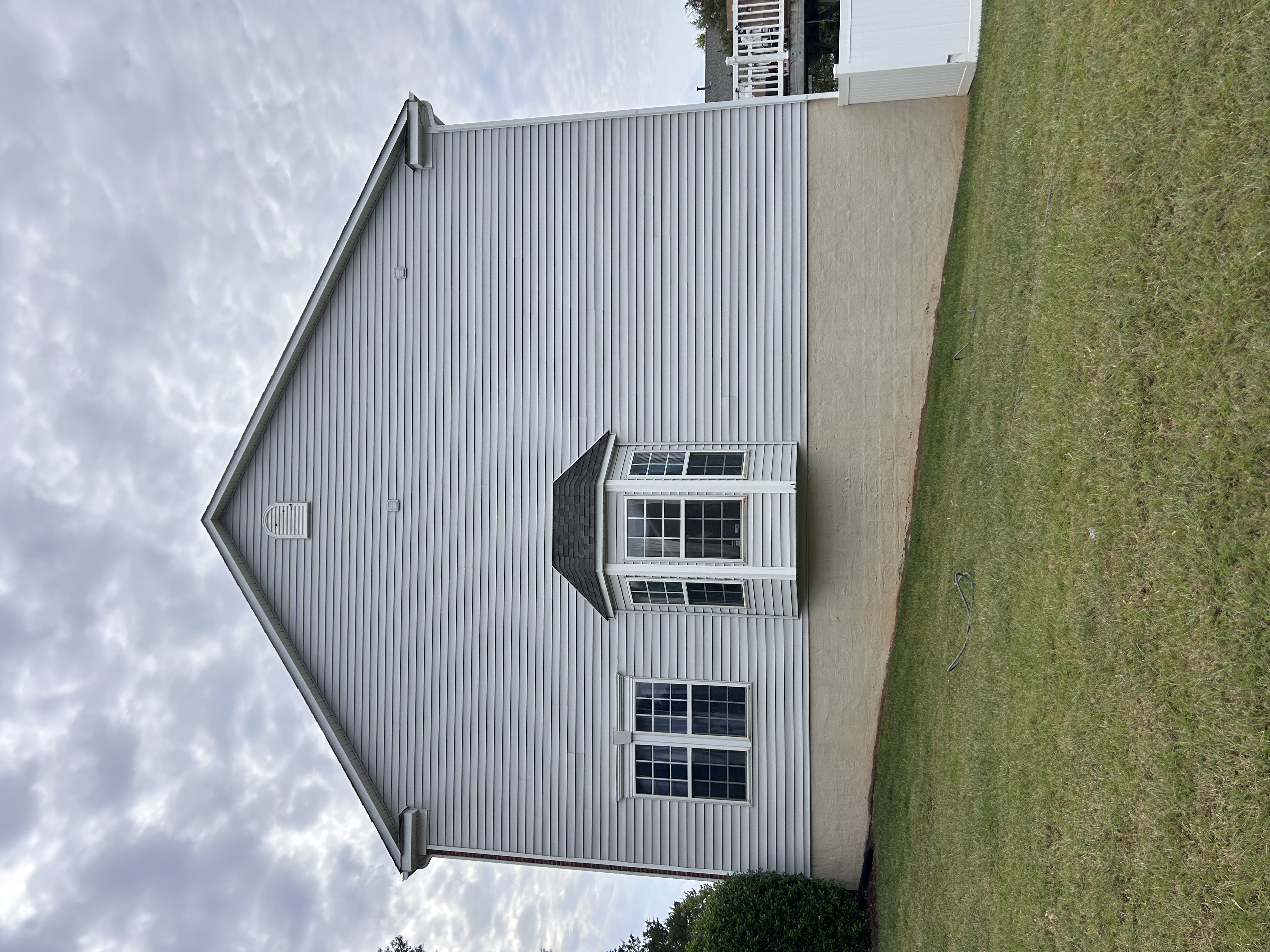 Pressure washing a driveway in Huntersville, NC